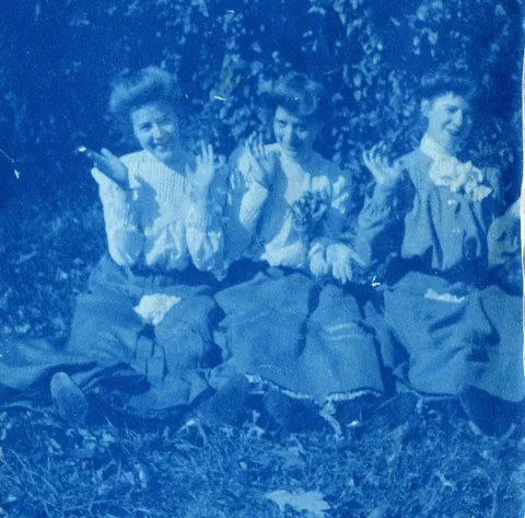 An unnamed young woman recorded her senior year at Asheville Female College in a photo album, Asheville, North Carolina, 1902. It includes a dorm room, group shots of friends, playing in snow, a visit to the mountains, their final midnight party before graduation, and graduation day itself.