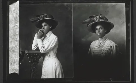 Young lady posing for her photo, sharp glass negative. 1900s.