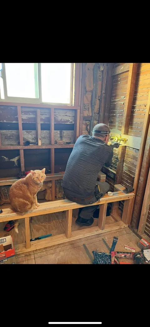 My husband and his cat remodeled our bathroom. He’s a tough foreman (the cat)