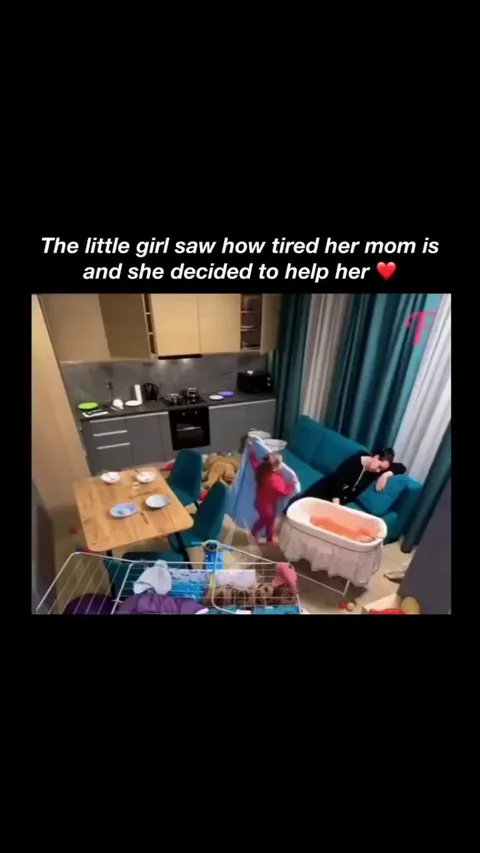 The little girl helping her tired mom