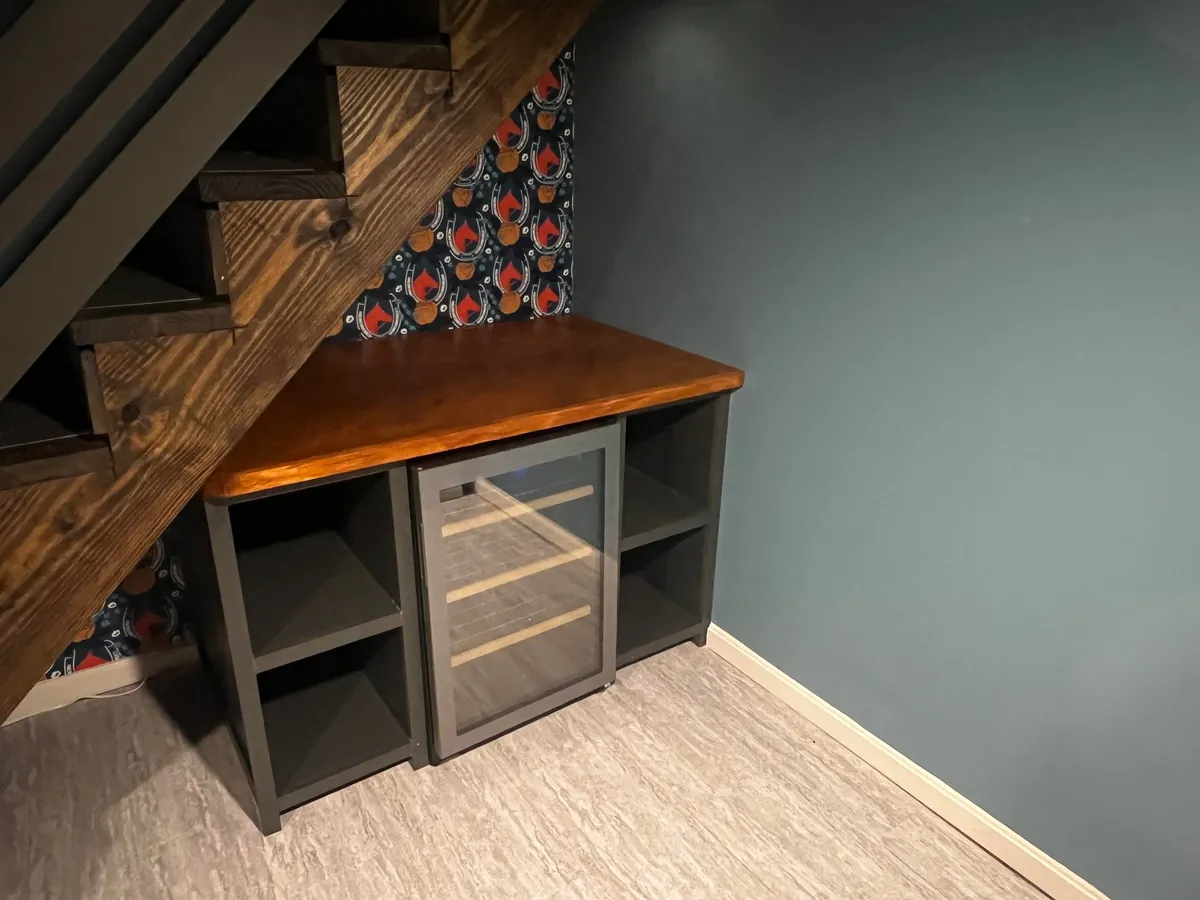First real furniture building project. Wanted a cabinet/bar in this small space under our basement stairs. Pretty happy with the results!