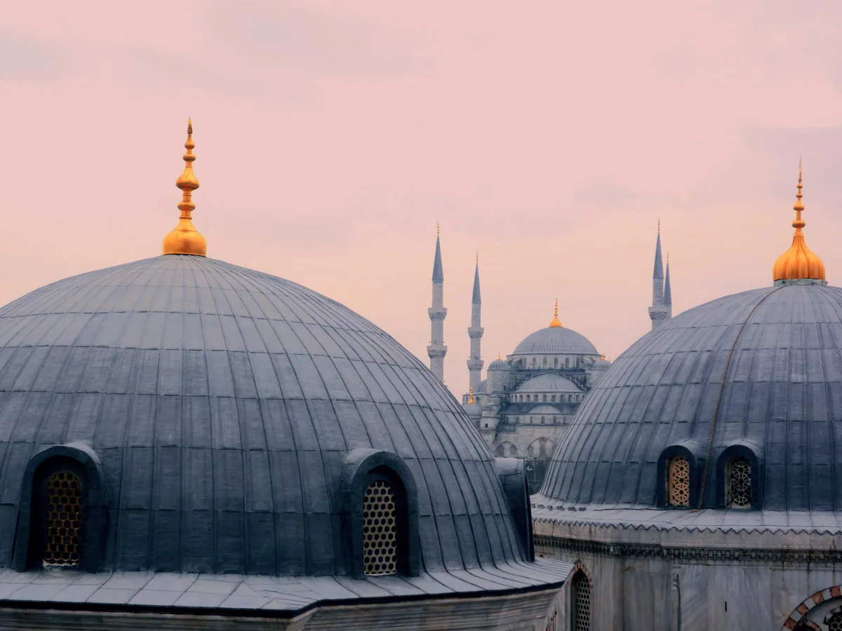 A view of the Blue Mosque taken through a small window inside the Hagia Sofia. Istanbul, Turkey.