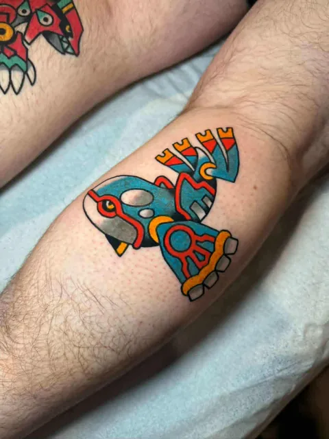 Kyogre tattoo by Losifer at Anime Ink Convention in Richmond, VA