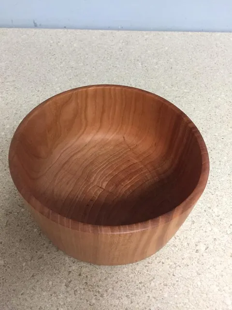 I was walking my dog around the block tonight and this guy stops me. He asks if I live in the house that recently had the tree cut down. I say yes and he tells me to hang tight. He comes out of his house with this. Says he made it from one of the logs of that tree! What a great gift and a great guy.