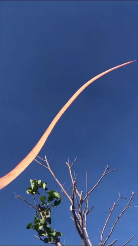 Kid being brought up into sky by a kite today in Taiwan