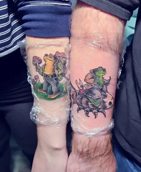 My brother and I got “matching” frog and toad tattoos by thewhitewolfartist in Maryland US
