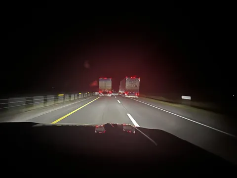 These semi trucks have been pacing each other for miiiiiiiiiles. Trapped. 