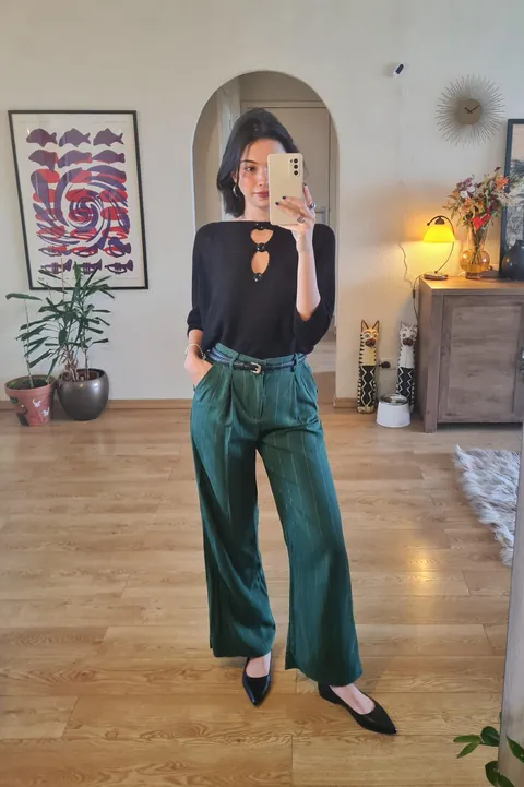 Black knit + green pinstripe pants