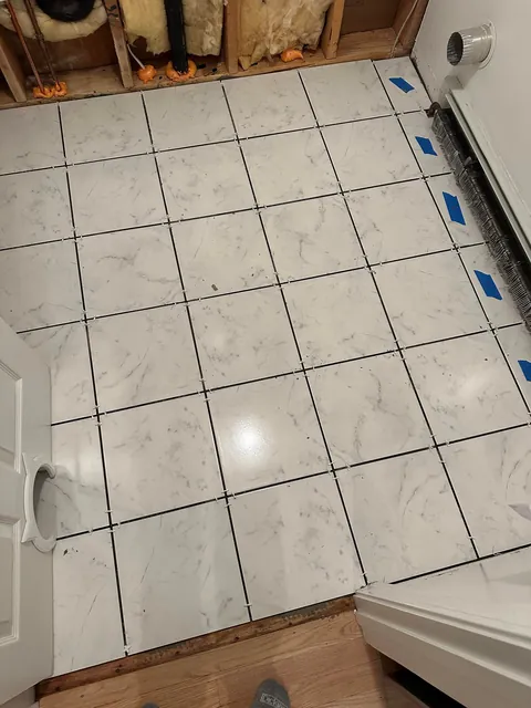 Washer flooded my laundry room so I learned how to tile.