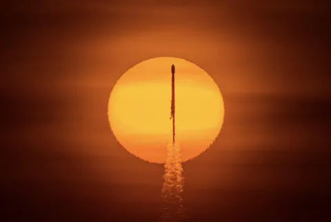 I photographed a SpaceX Falcon 9 rocket transiting the sun during its recent launch of 60 Starlink satellites