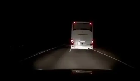 Bus Driver Signals To Driver When It Is and Is Not Safe to Pass