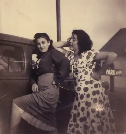 My grandma (right) and her sister - 1951. She won $15 in a raffle, bought that polka dot dress, and had enough leftover to take the family to dinner.