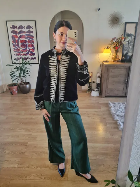 Black knit + green pinstripe pants