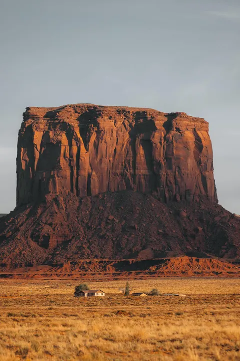 a tiny neighborhood and a massive butte