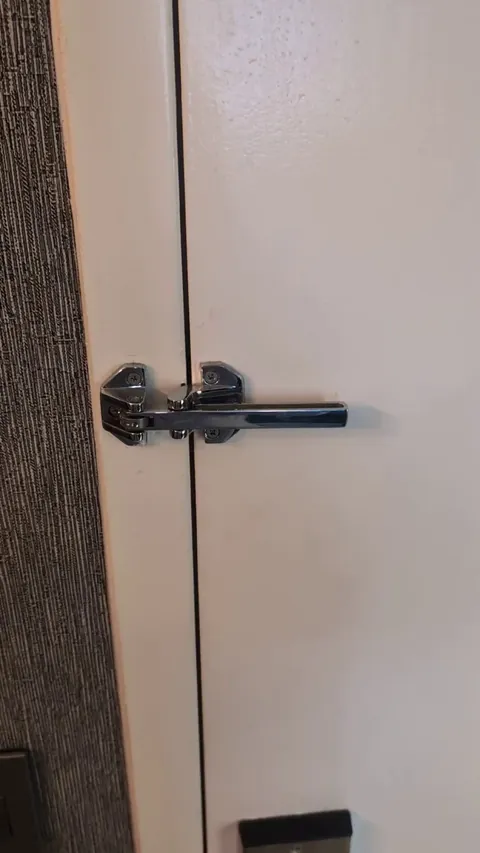 This door latch at a "luxury" hotel