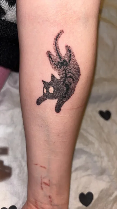 Tattoo done by me on my friend after she lost her cat