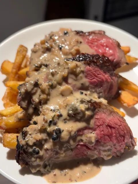 steak frites with peppercorn sauce
