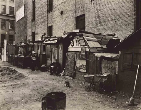 Unemployed at their huts in a Hooverville in New York City, 1935 (West Houston and Mercer Street)