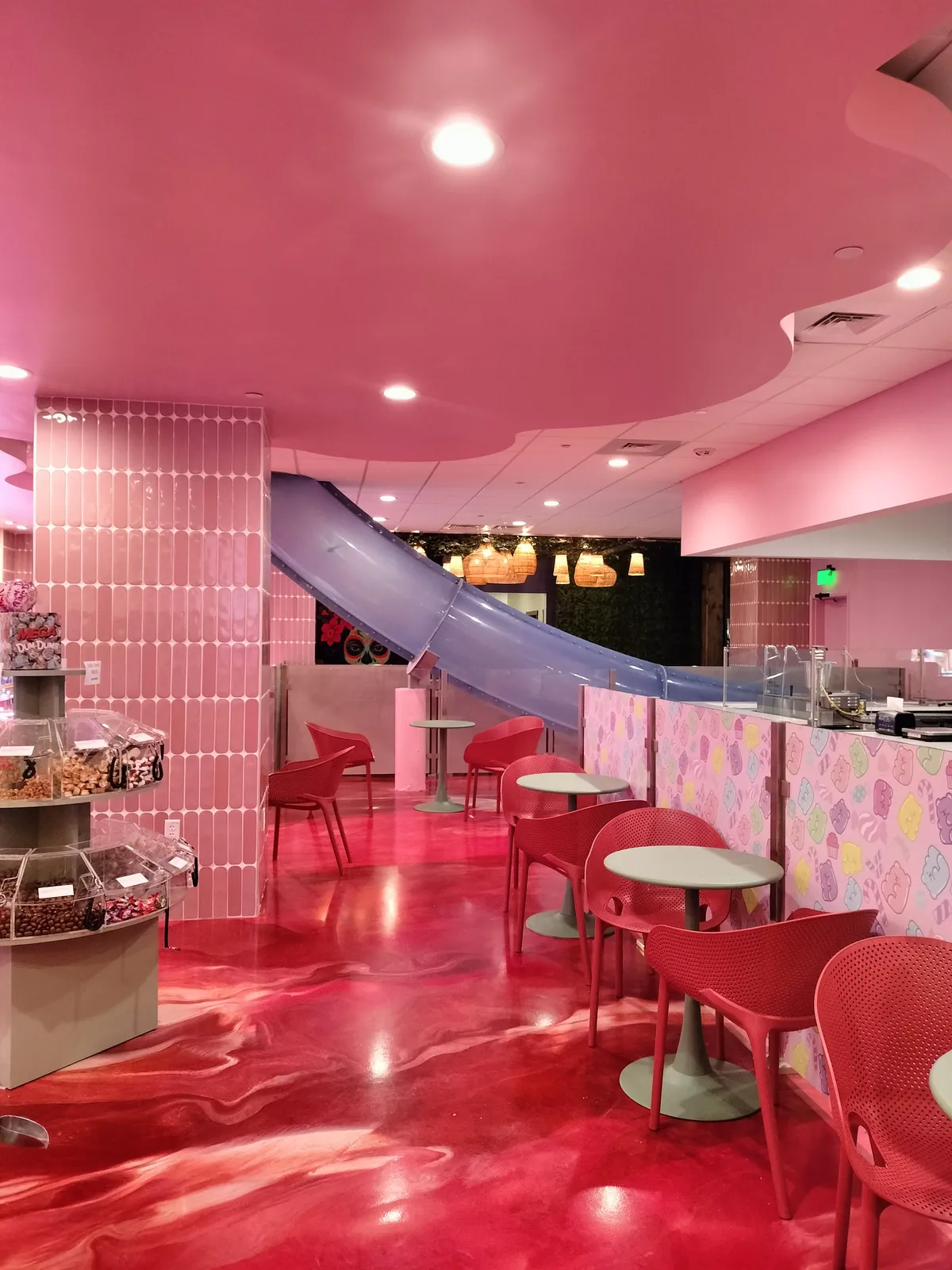 Resort water park slide goes through candy shop