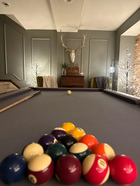 Remodeled my boring basement with reclaimed brick and structural wood