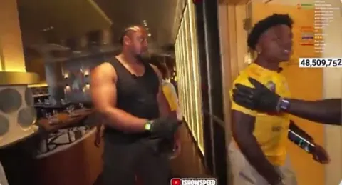 IShowSpeed bodyguards encourage Speed to take a restroom break after the cow blood, uncooked meat, and Ethiopian coffee gets to his stomach and Zimbabwe Speed takes his place for several minutes