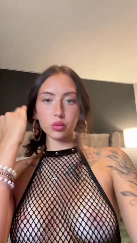 Collared, caged in mesh, and so ready to be played with