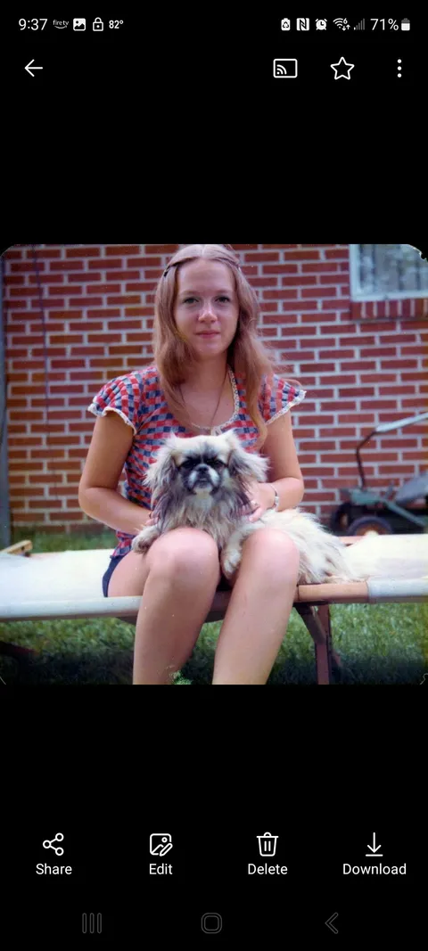 My mom and her dog in the 60's. 