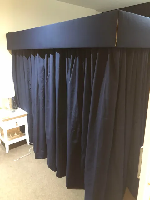 My new four-poster bed with curtains that actually close.