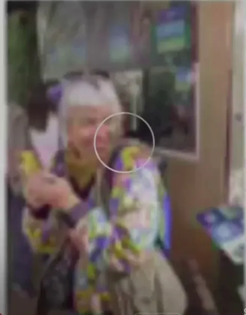 Hummingbird mistakes woman’s colorful hair as a flower