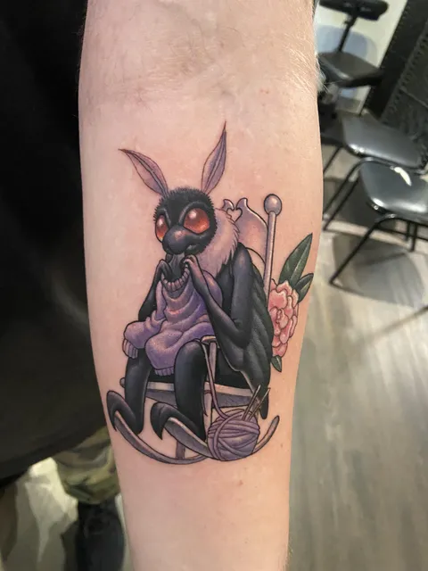 My first tattoo! Mothman eating a sweater. Hopefully the first of many.