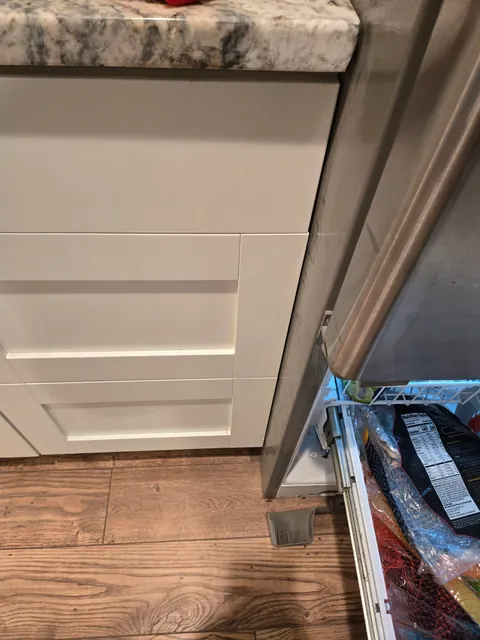 Help: fridges freezer too close for baseboard
