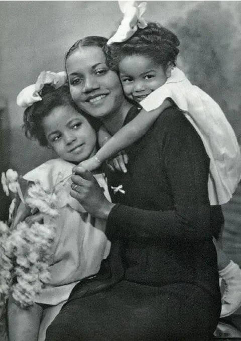 Mommy's girls, c. 1940's.