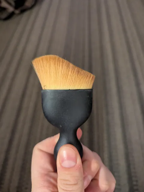 I got this brush in a car interior cleaning set for $8 and it contours better than anything I've ever bought