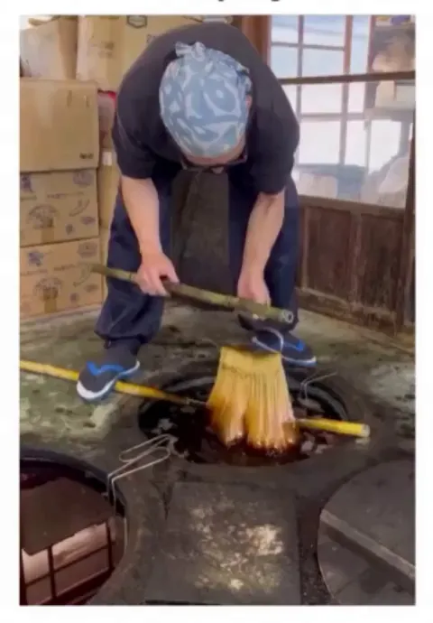 Indigo threads changing colour due to oxidisation with air through a Japanese dyeing process that is 600 years old