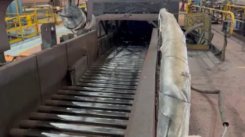 I work in a steel mill and we were rolling one of our largest sections earlier this week. I thought it was a good opportunity to test out the 'you-beaut' camera settings on my phone.