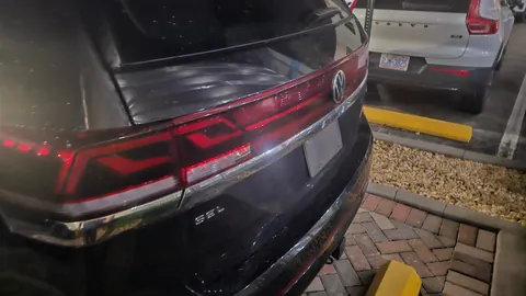 Three ICE Cars Taking Up The Three Electric Charging Spots At The Hotel