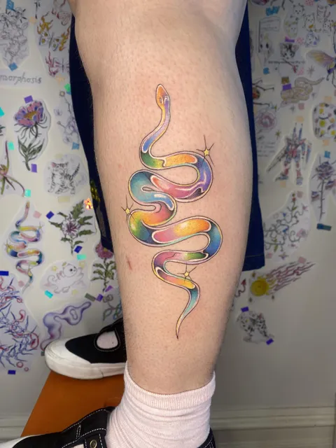 Rainbow chrome snake by Germ at Crucible Tattoo Co in Melbourne, Australia