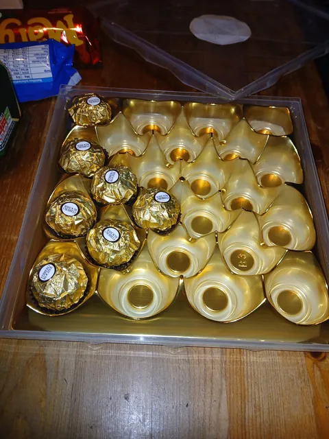 Left my dad unsupervised with a full tray of chocolates we were supposed to share (50/50) for an hour. This is what I returned to