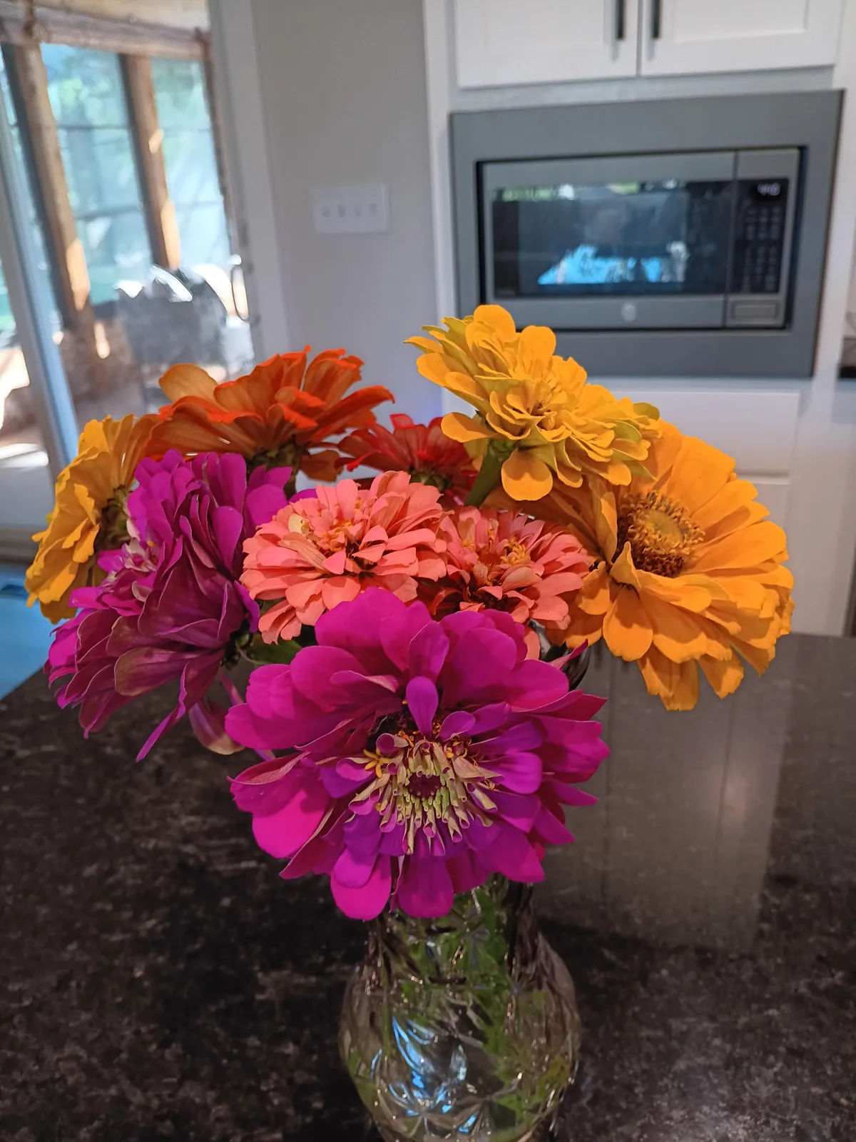 I planted zinnia seeds from the dollar store with no expectations. Here is our first homegrown bouquet!