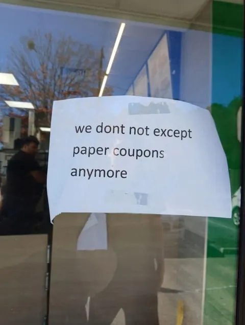 This sign at a local subway that mails paper coupons out every other week