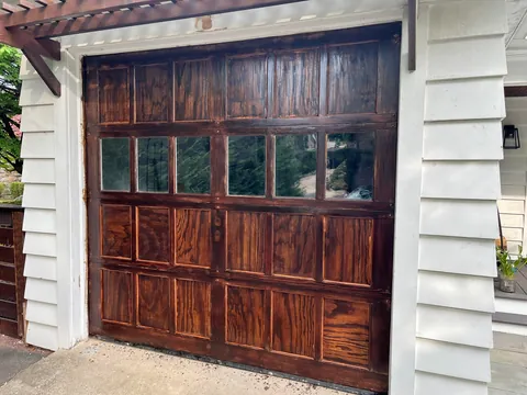 Only took all summer… finally stained my garage door.