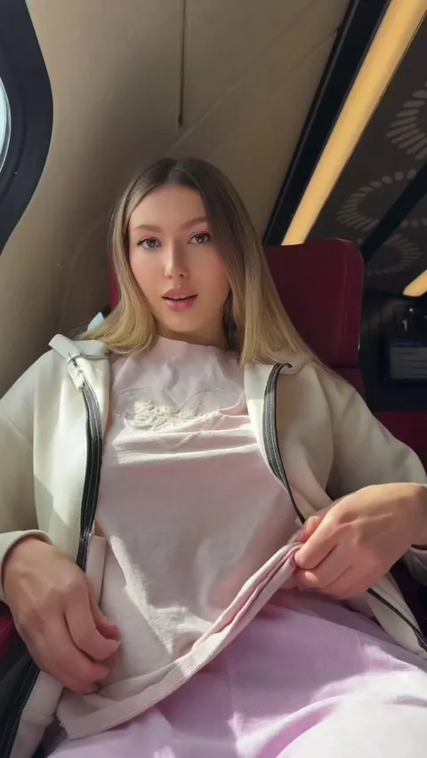 Revealing tits in the train