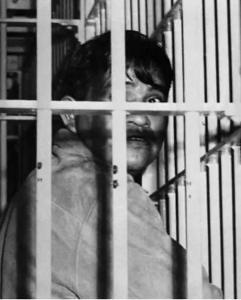 Ira Hayes, a Native American marine immortalized raising the American flag over Iwo Jima, sits in a Los Angeles jail cell (1953). Crippling PTSD and unwanted fame saw Hayes arrested 52 times for public intoxication after the war. He froze to death in the Arizona desert while drunk in 1955.