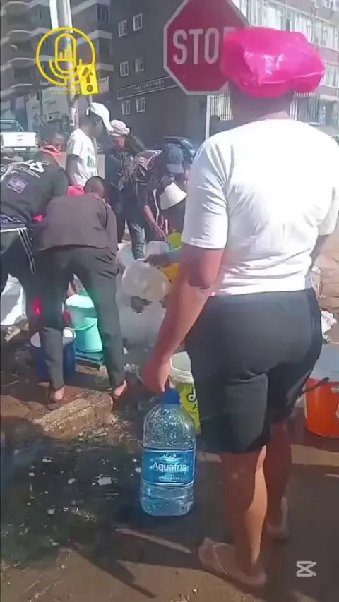 So many buildings in South Africa are without running water that residents break into public water pipes to collect drinking water