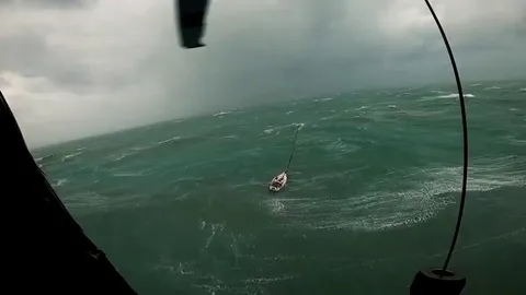 Coast Guard rescues man and dog during Hurricane Helene