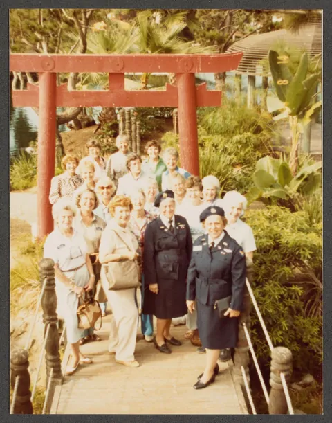 Photos of a group of WASP (Women Airforce Service Pilots) veterans posing together at their 1984 reunion in San Diego, CA