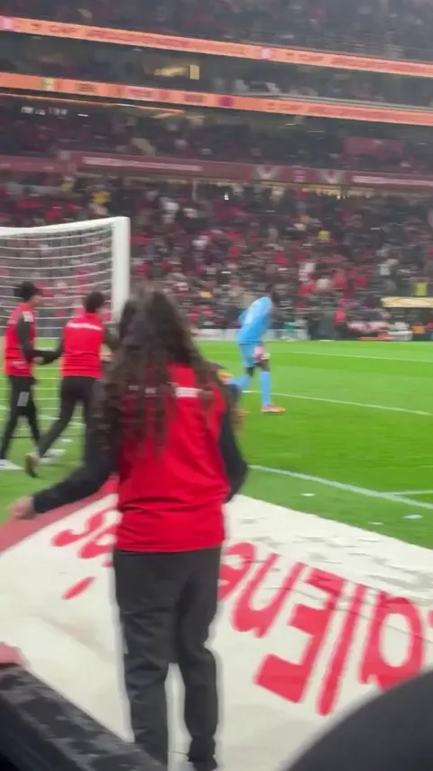 Senegalese player being chased by Mororrocan ball boys.
