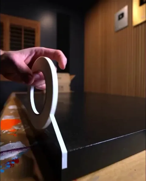 Layered art on canvas using masking tape