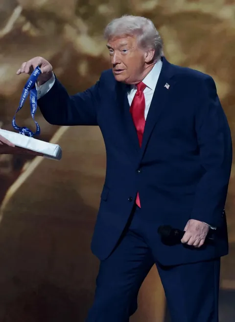 PsBattle: Trump accepting FIFA Peace Prize
