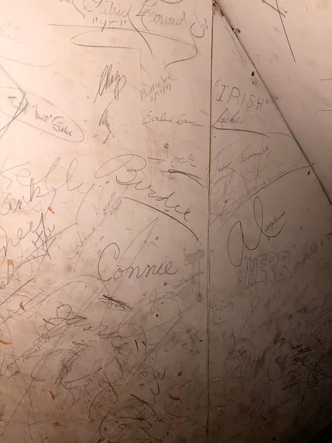 Signatures of party-goers from the 40s and 50s in my century y/o basement